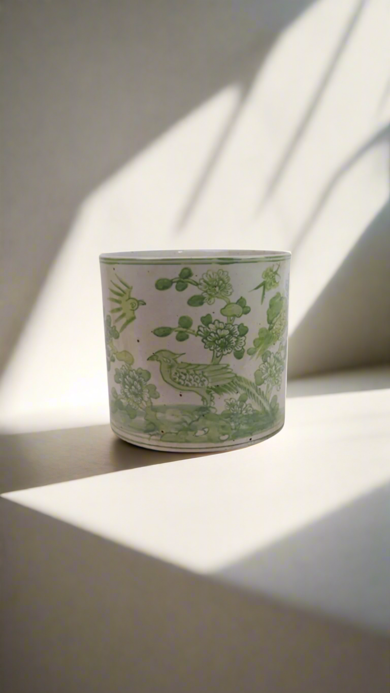 Blomsterpotte med grønt natur-motiv